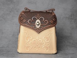 Hand tooled leather purse,