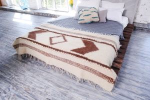 Small white-brown wool throw