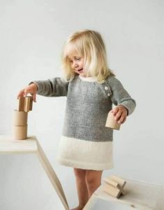 Modern knitted baby girl dress