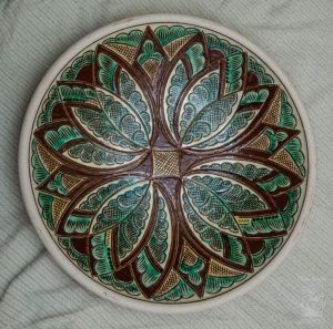 Керамічна декоративна тарілка "Дика квітка"