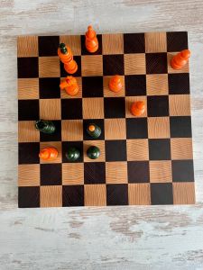 Solid walnut and maple chess board, 
