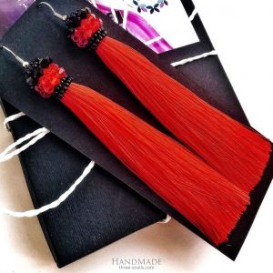 Long red tassel earrings